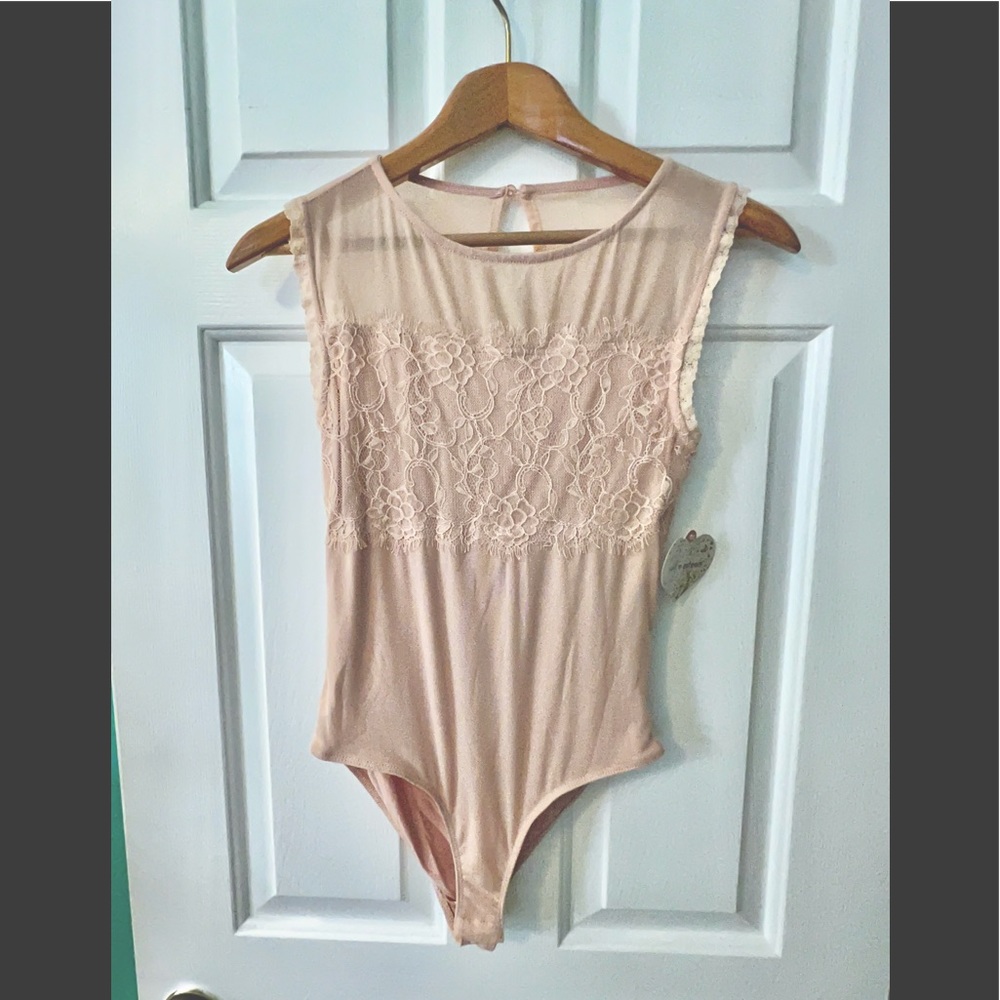 Pale pink one piece bodysuit, size Medium by Self Esteem